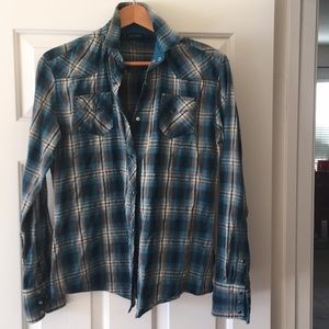 Kuhl plaid shirt with snap buttons.